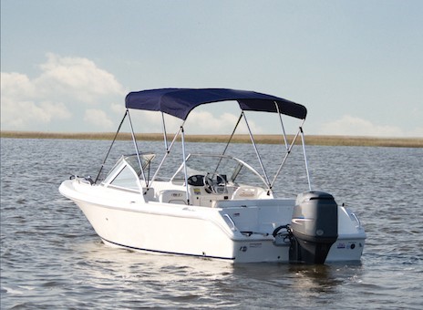 bimini top on a boat on a lake